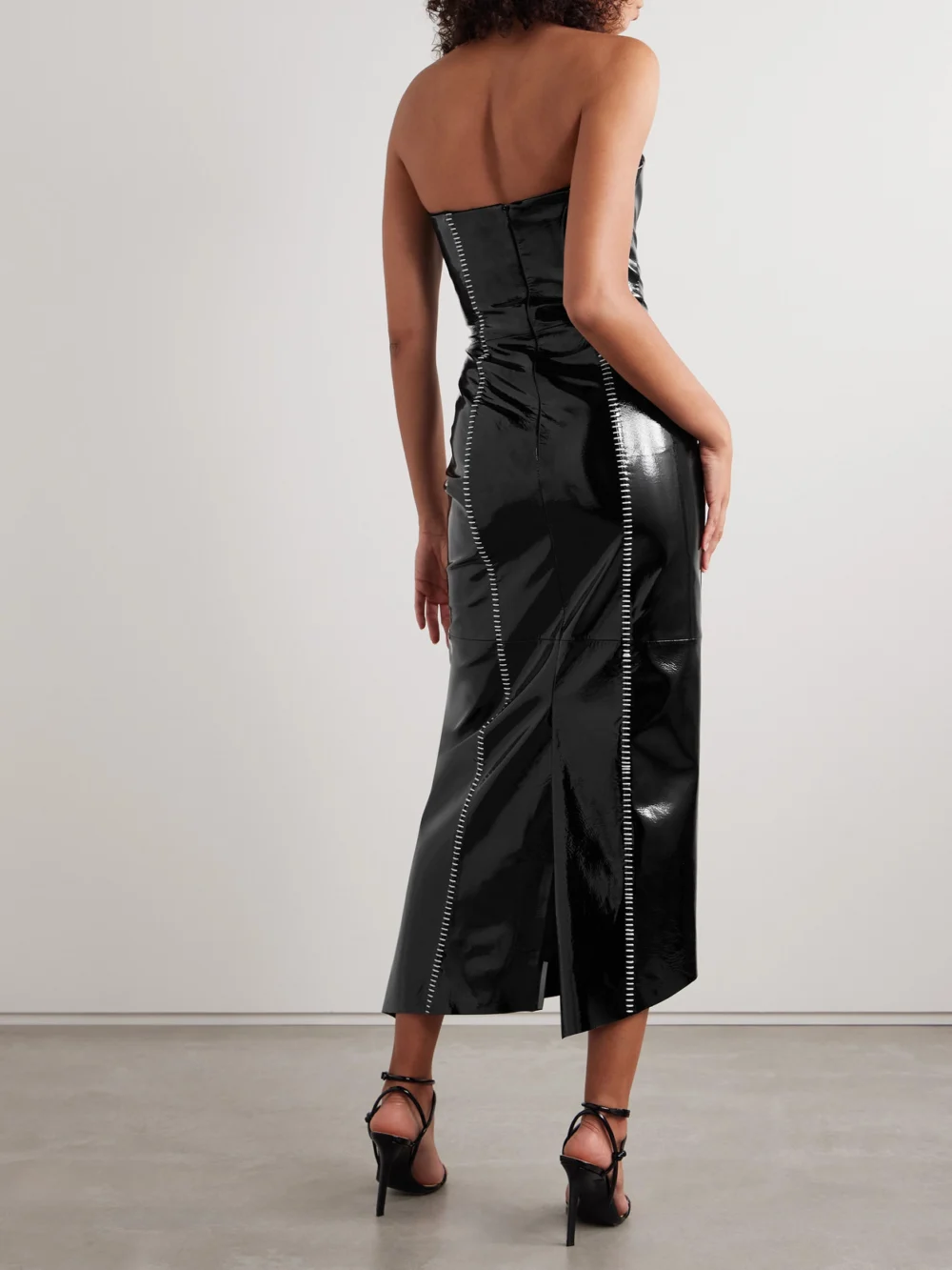 Back view of the Salon 1884 Sioux Strapless Asymmetric Whipstitched Patent-leather Dress