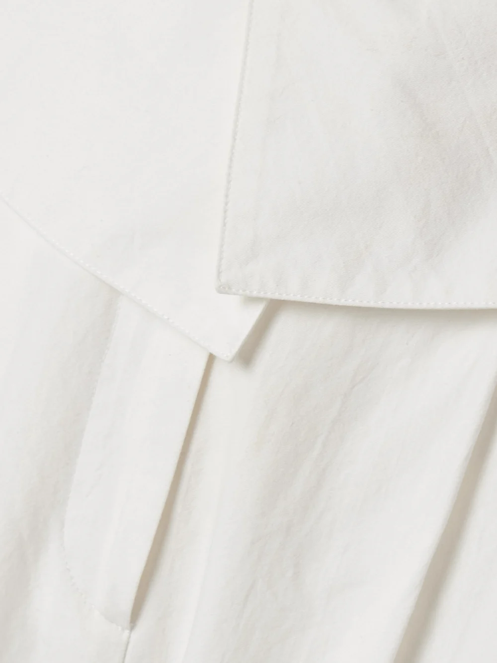 Close-up detail of the Salon 1884 Soren Layered Pleated Cotton-blend Poplin Tapered Pants
