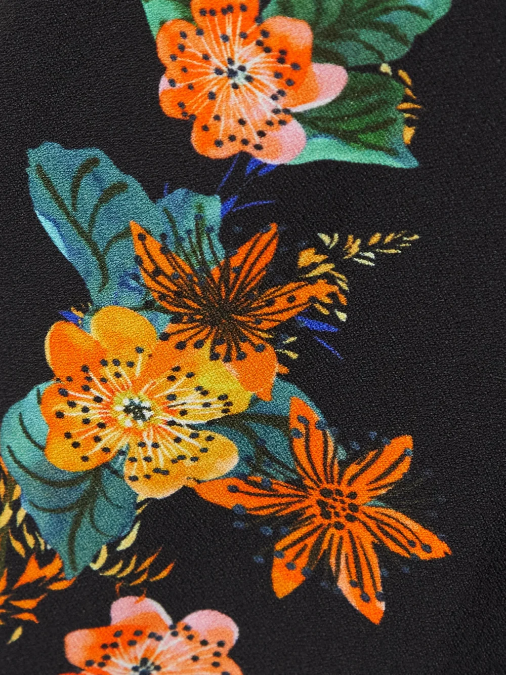 Close-up detail of the Saloni Bryce Belted Printed Crepe Jumpsuit