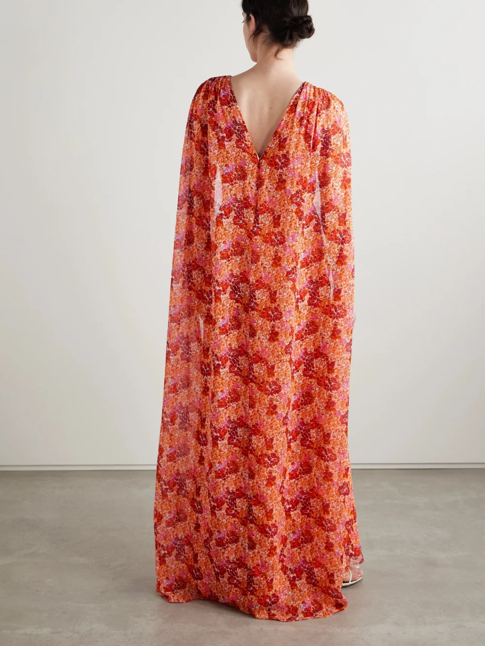 Back view of the Saloni Claudia Cape-effect Floral-print Silk-georgette Gown