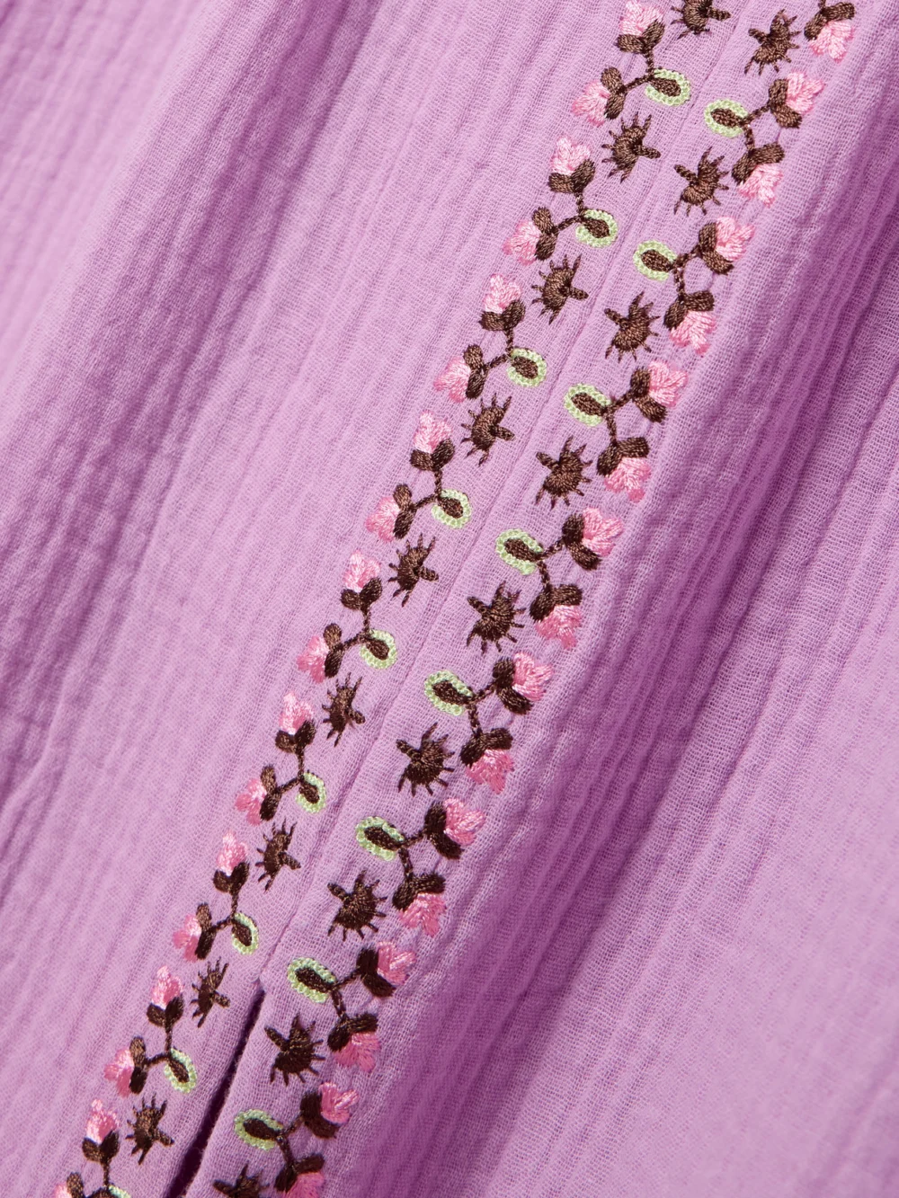 Close-up detail of the Saloni Jamie Tie-detailed Embroidered Cotton-seersucker Midi Dress