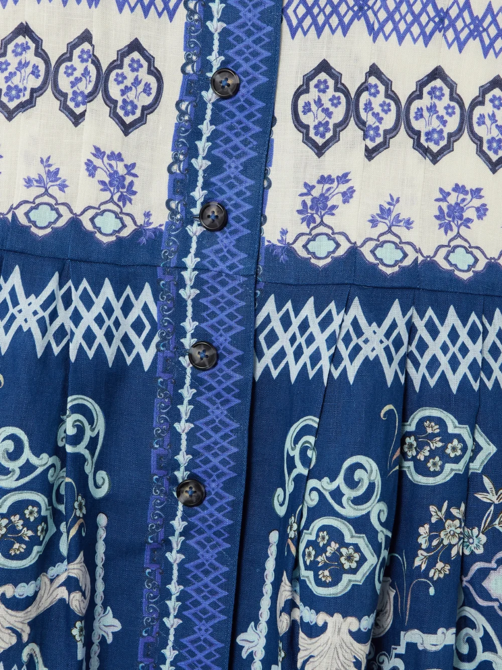 Close-up detail of the Saloni Nya Belted Floral-print Linen Midi Shirt Dress