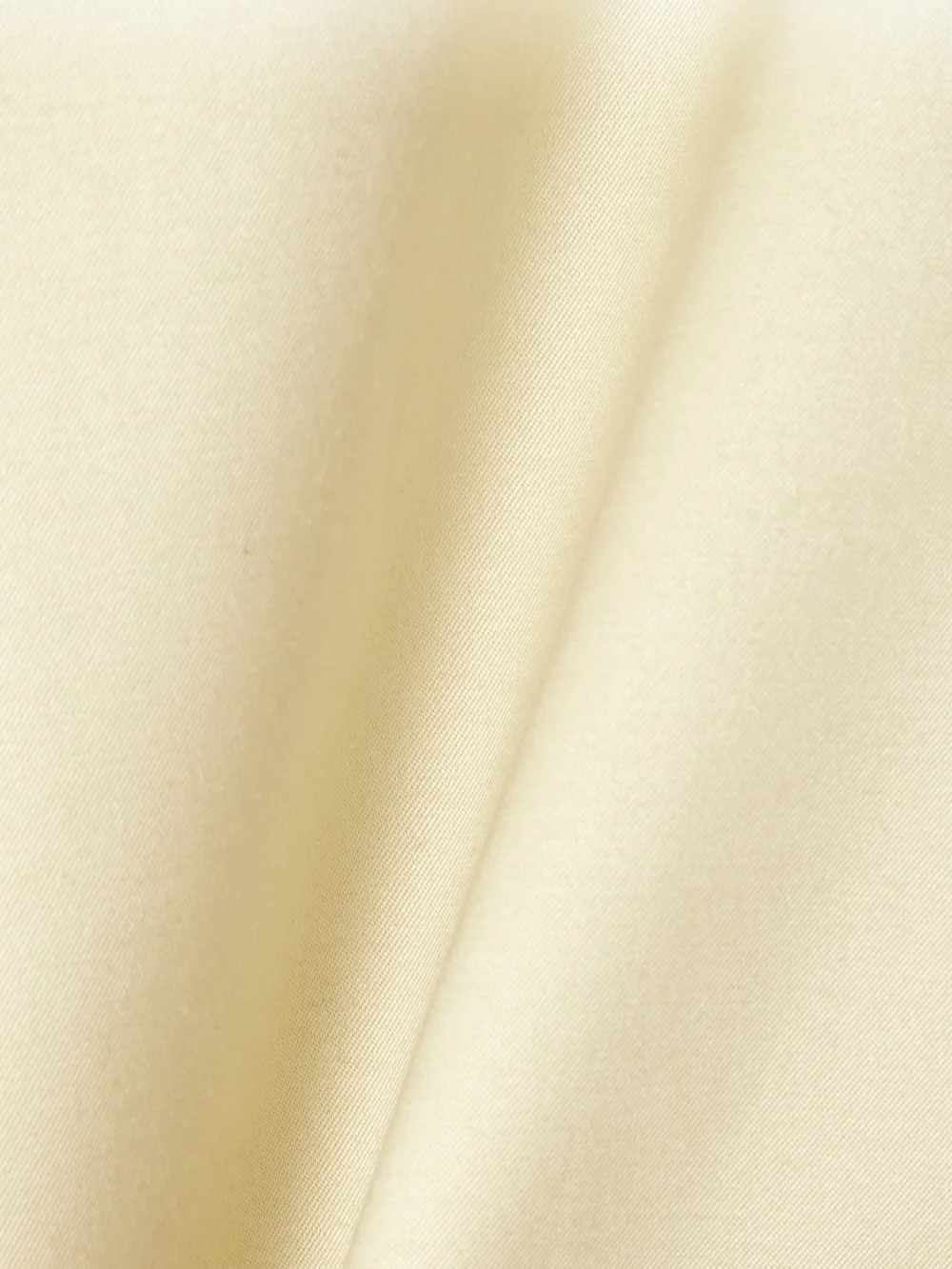 Close-up detail of the Sasuphi Andrea Silk and Cotton-blend Twill Mini Wrap Skirt