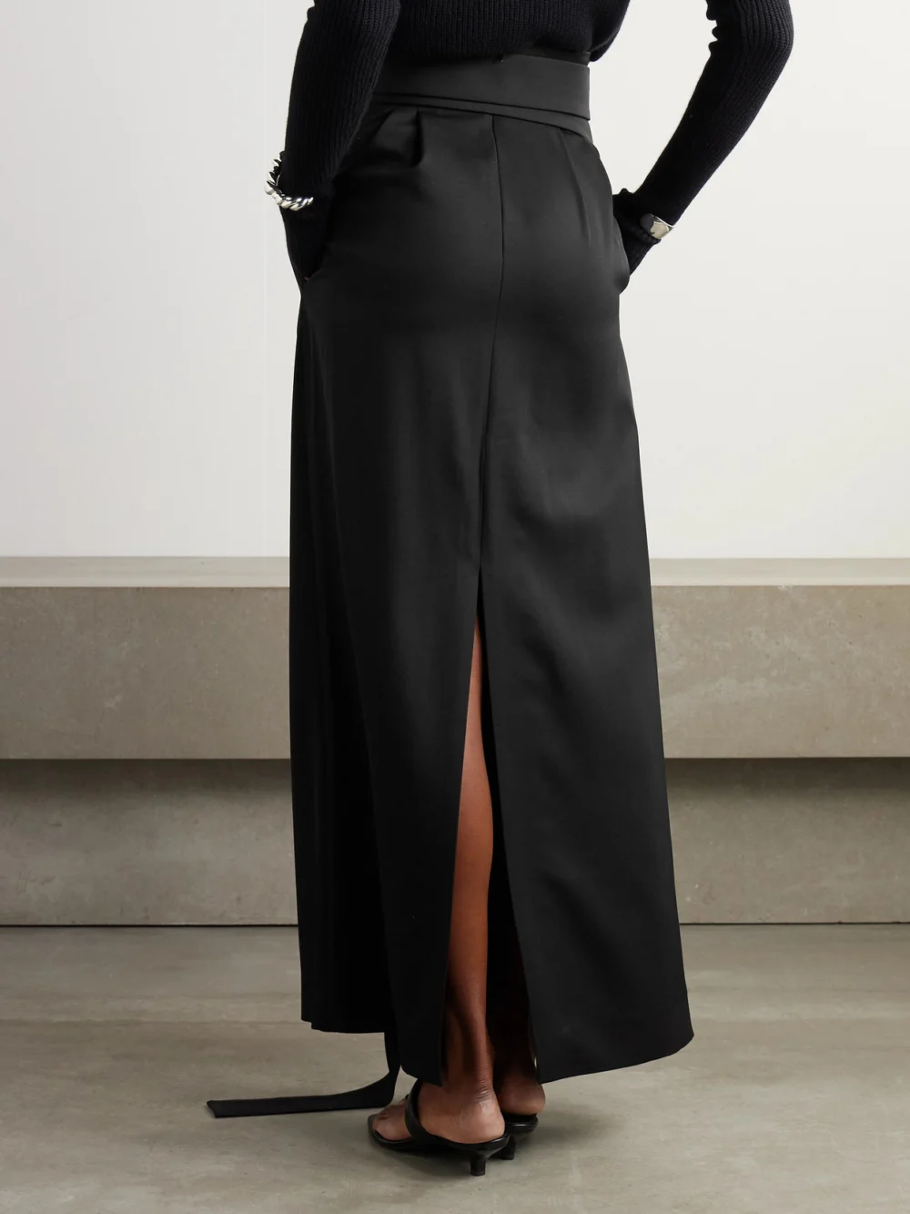 Back view of the Sasuphi Angela Belted Pleated Grain De Poudre Wool Maxi Skirt