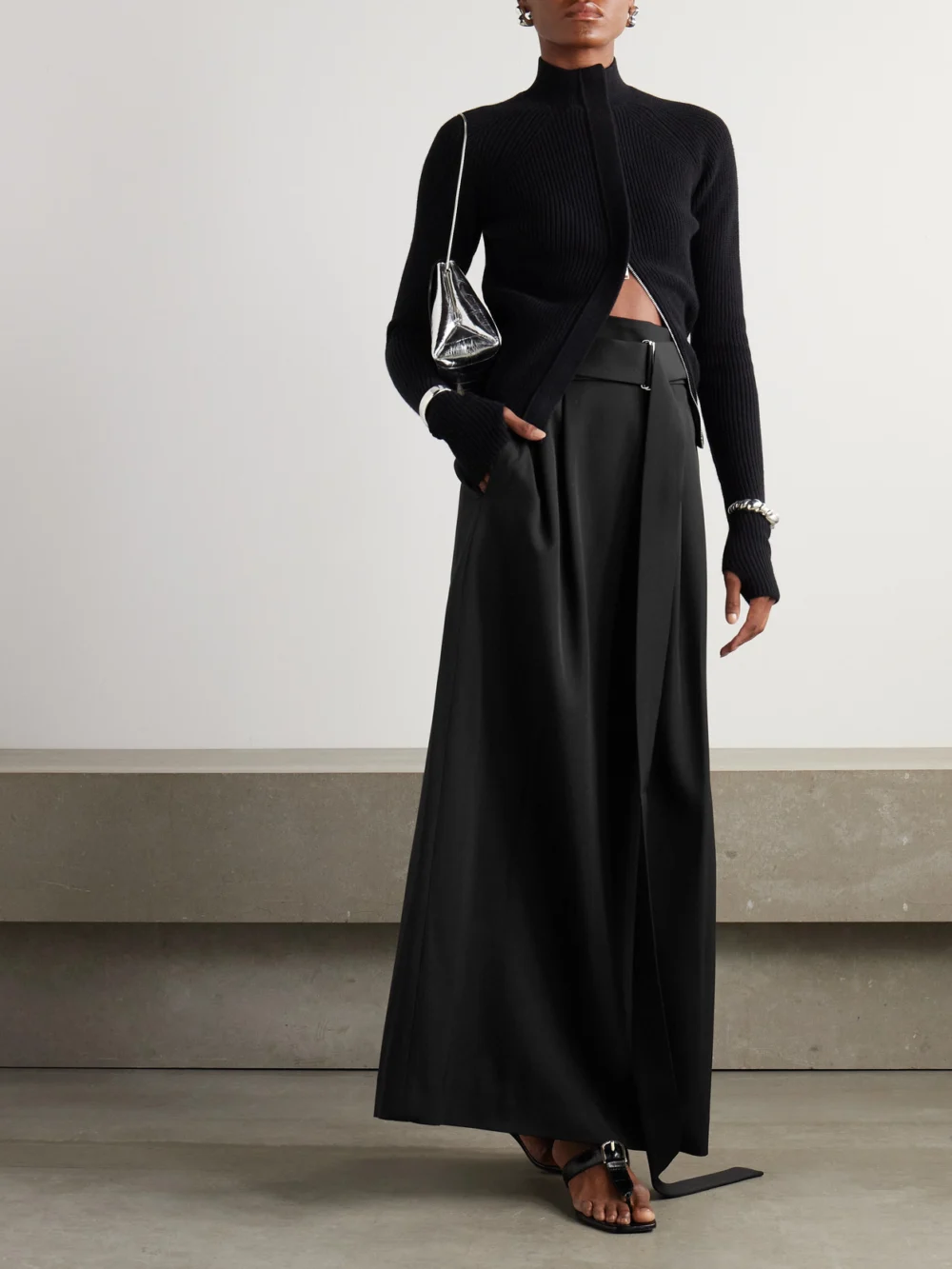 Sasuphi Angela Belted Pleated Grain De Poudre Wool Maxi Skirt, worn by a model
