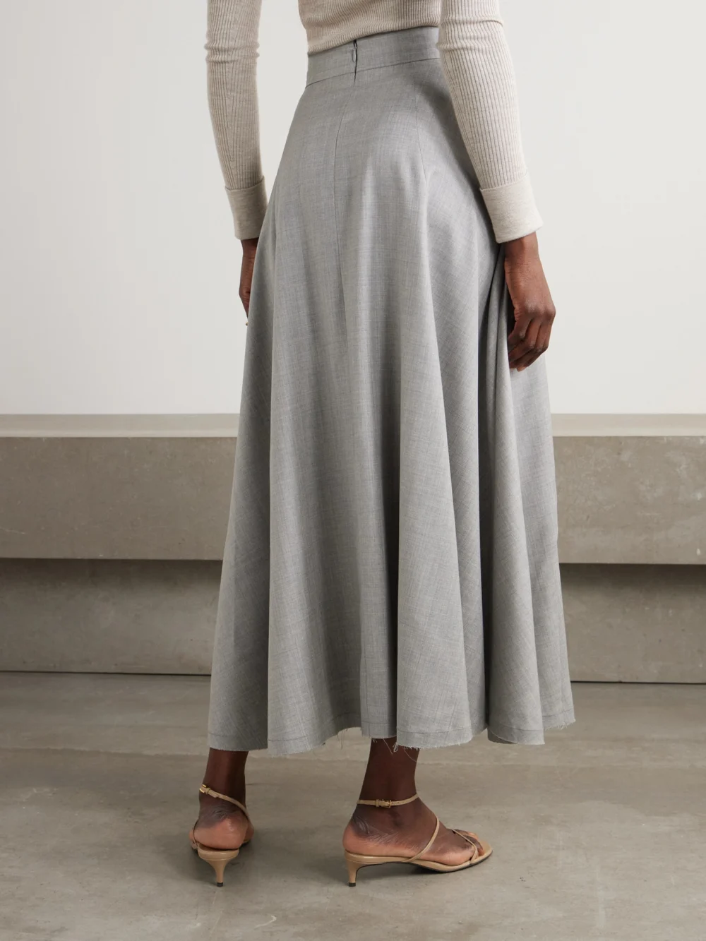 Back view of the Sasuphi Lauren Frayed Wool Maxi Skirt