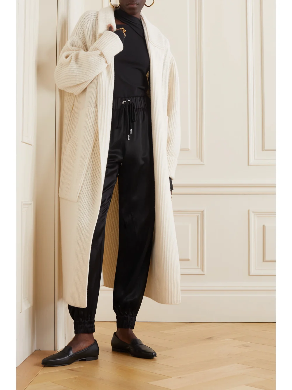Sasuphi Valentina Duchesse Silk Tapered Track Pants, worn by a model