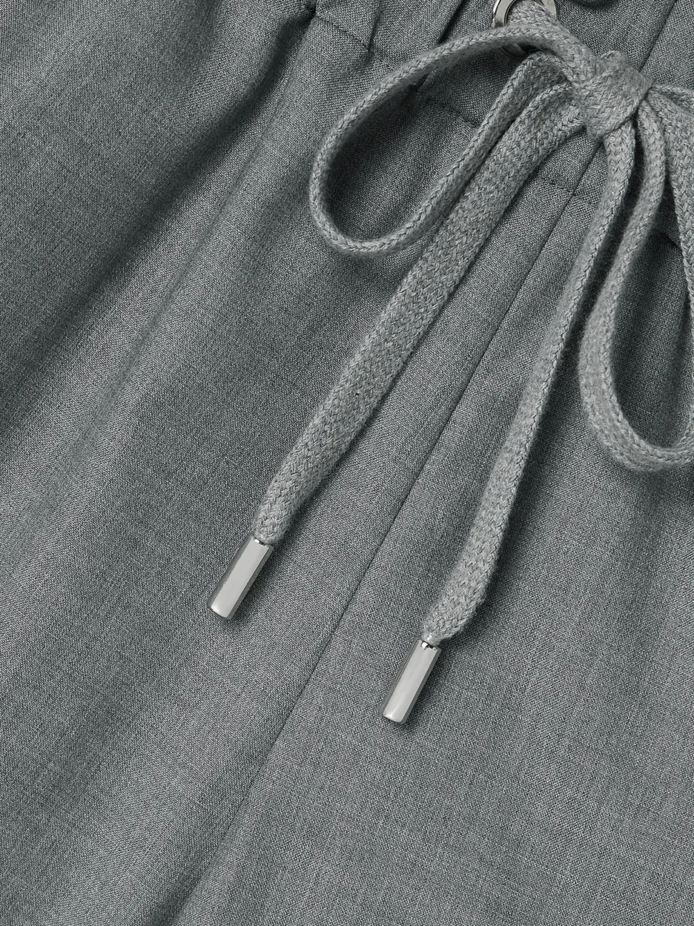 Close-up detail of the Sasuphi Valentina Wool Shorts