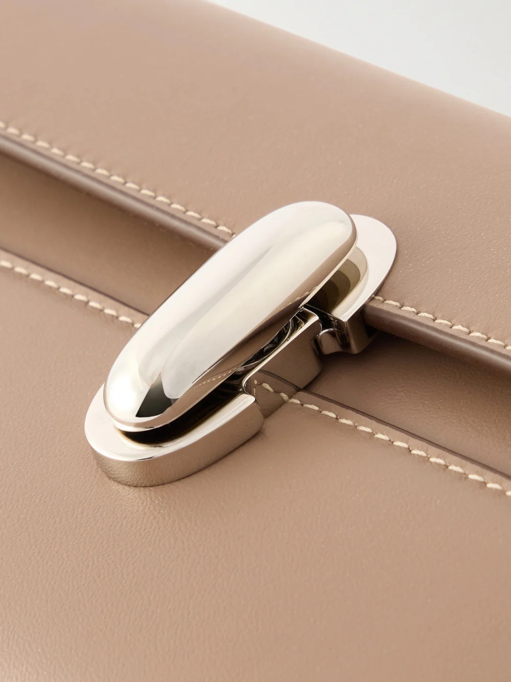 Close-up detail of the Savette Symmetry Mini Leather Shoulder Bag