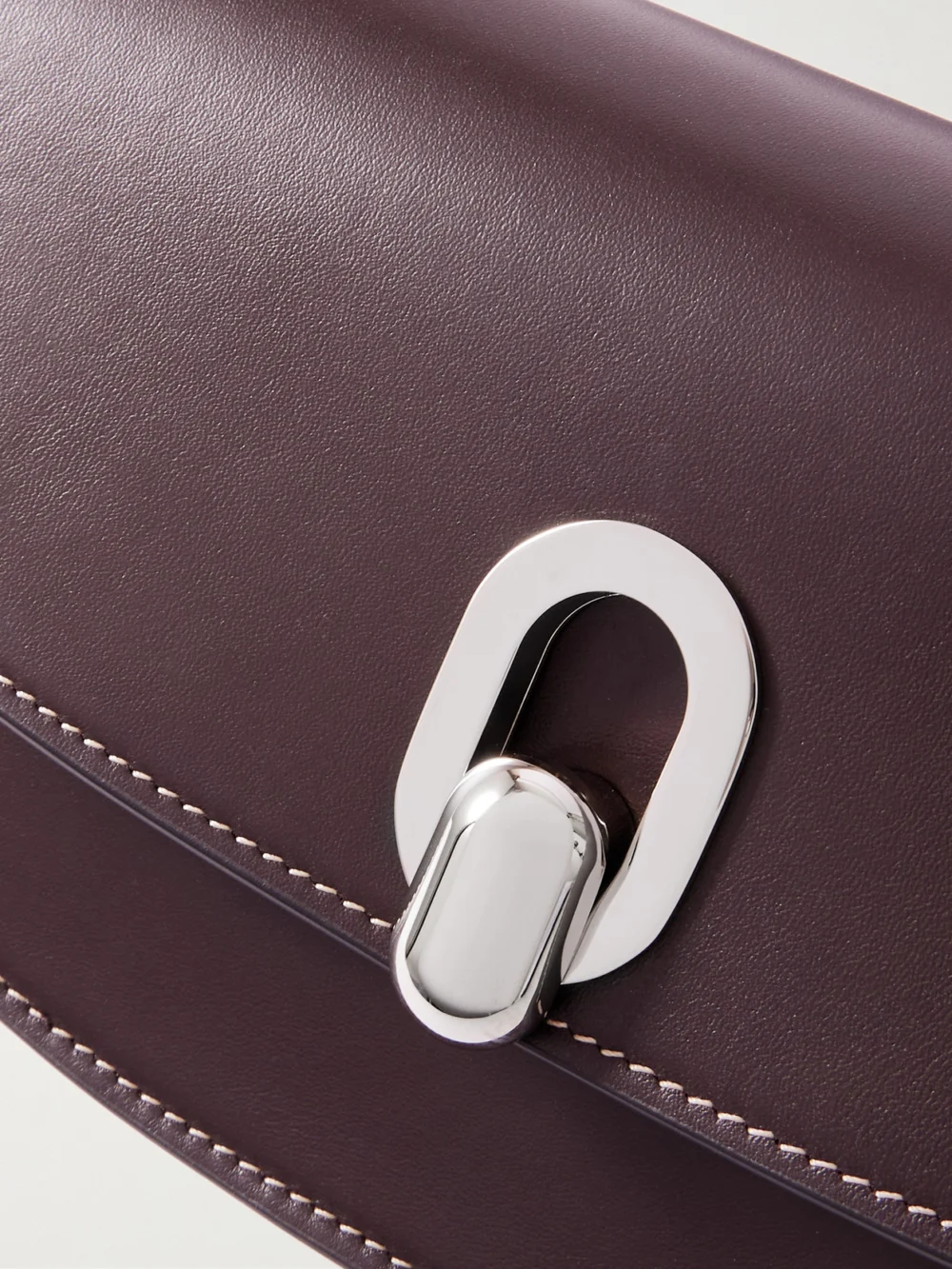 Close-up detail of the Savette Tondo Crescent Leather Shoulder Bag