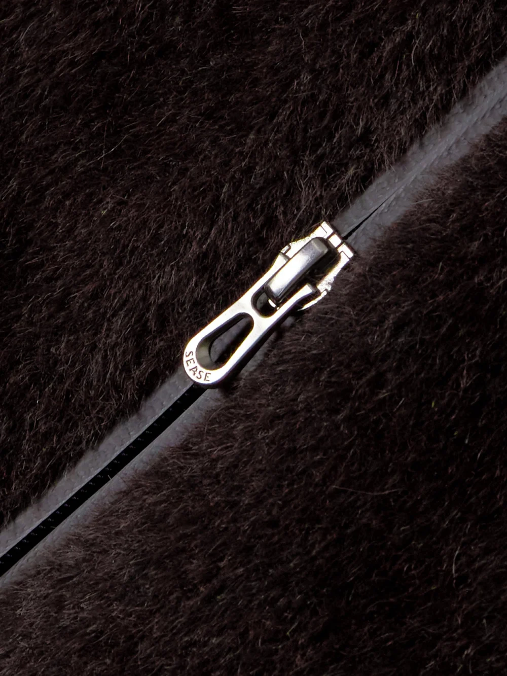 Close-up detail of the Sease Armor 3.0 Hooded Padded Alpaca Jacket