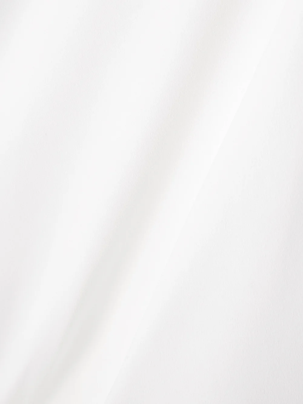 Close-up detail of the Self-Portrait Draped Crepe Halterneck Mini Dress