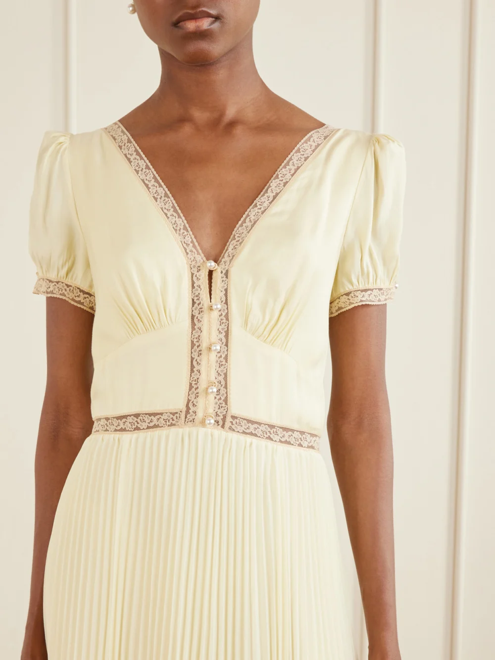 Close-up detail of the Self-Portrait Lace-trimmed Pleated Crepe Midi Dress