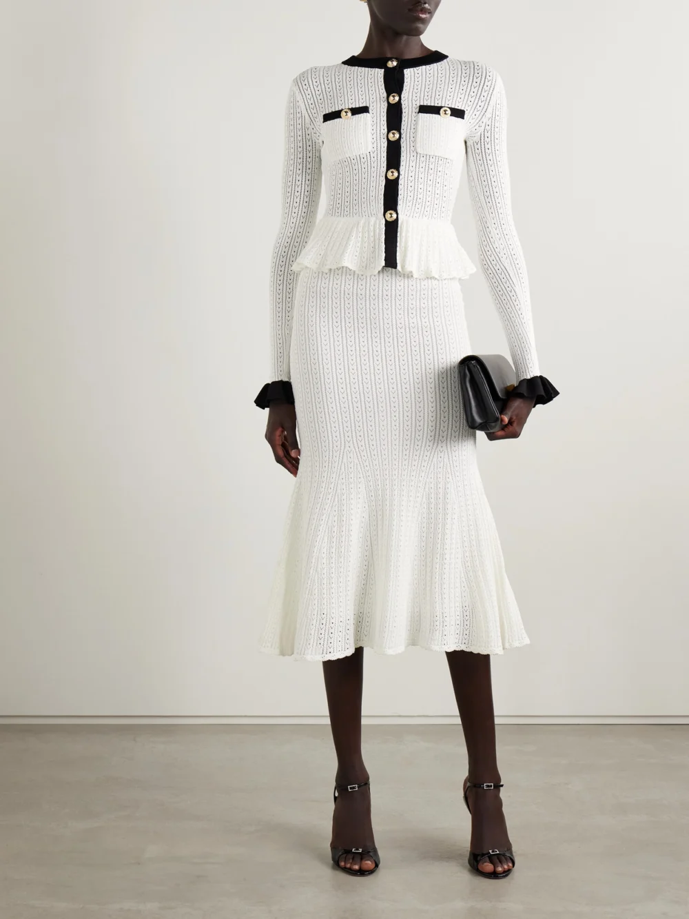 Self-Portrait Pointelle-knit Peplum Midi Dress, worn by a model