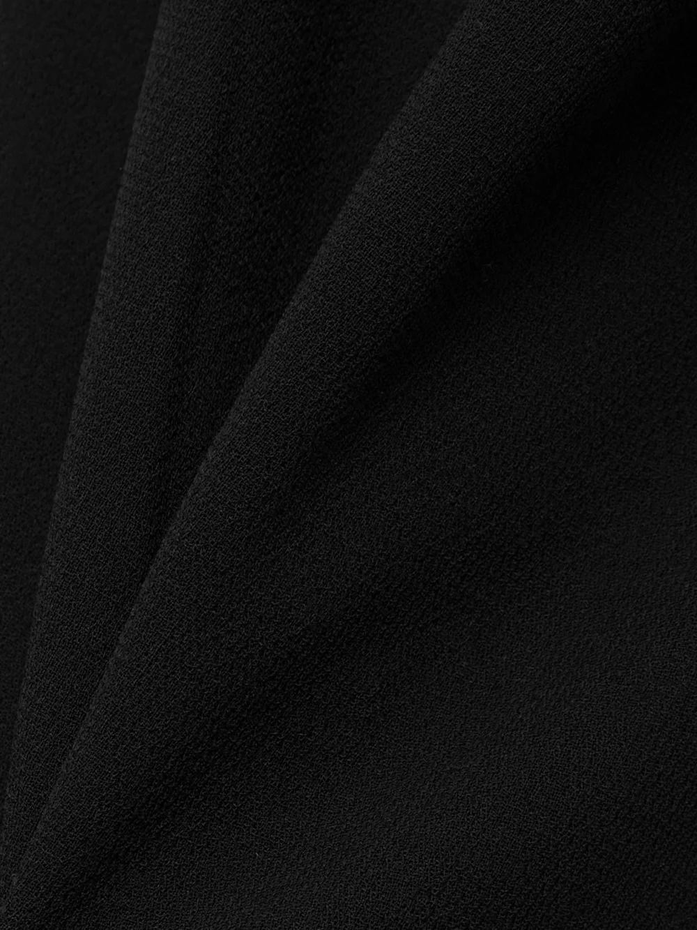 Close-up detail of the Sergio Hudson Draped Wool-blend Crepe Maxi Skirt