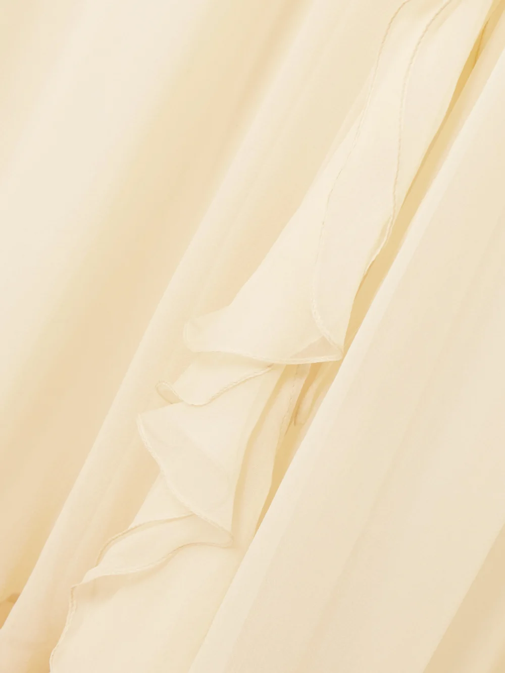 Close-up detail of the Sharon Wauchob Abae Asymmetric Ruffled Silk-mousseline Midi Dress