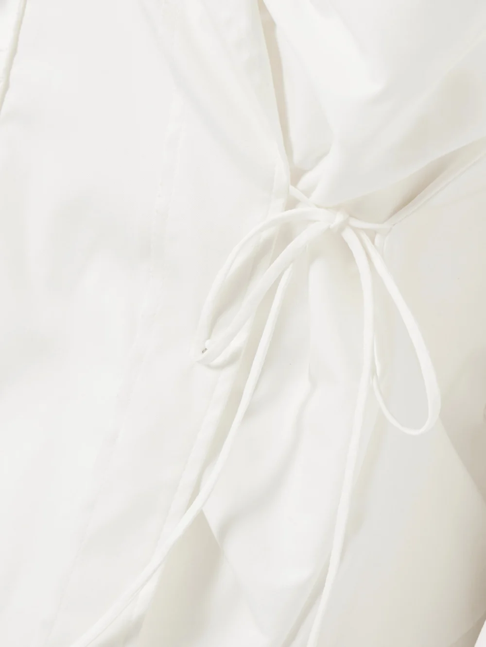 Close-up detail of the Sharon Wauchob Bann Tie-detailed Gathered Cotton-poplin Shirt