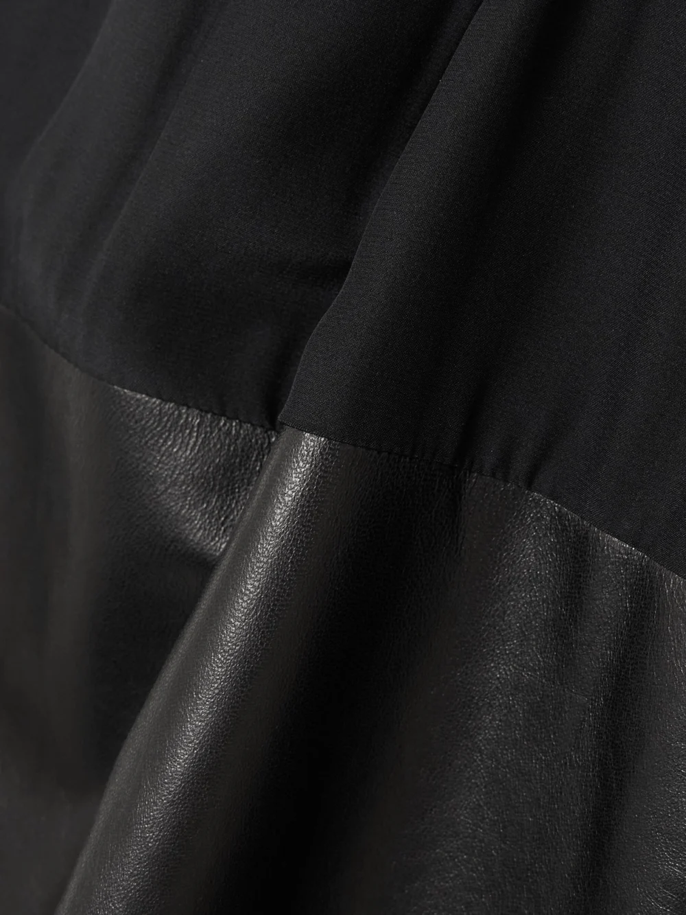 Close-up detail of the Sharon Wauchob Laure Paneled Silk-jersey and Leather Midi Skirt