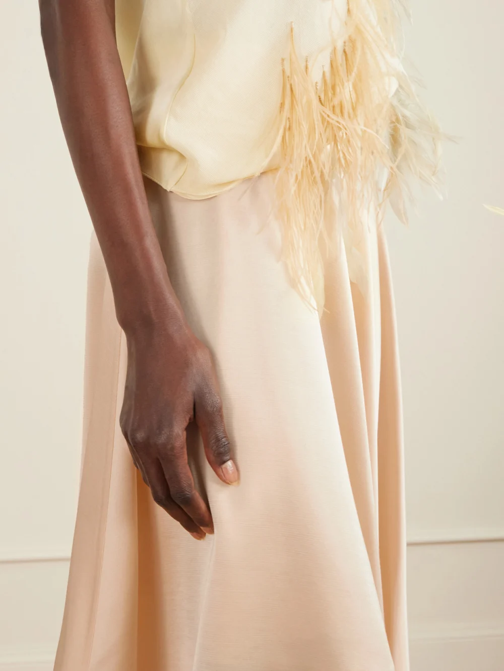Close-up detail of the Sharon Wauchob Oly Asymmetric Satin Skirt