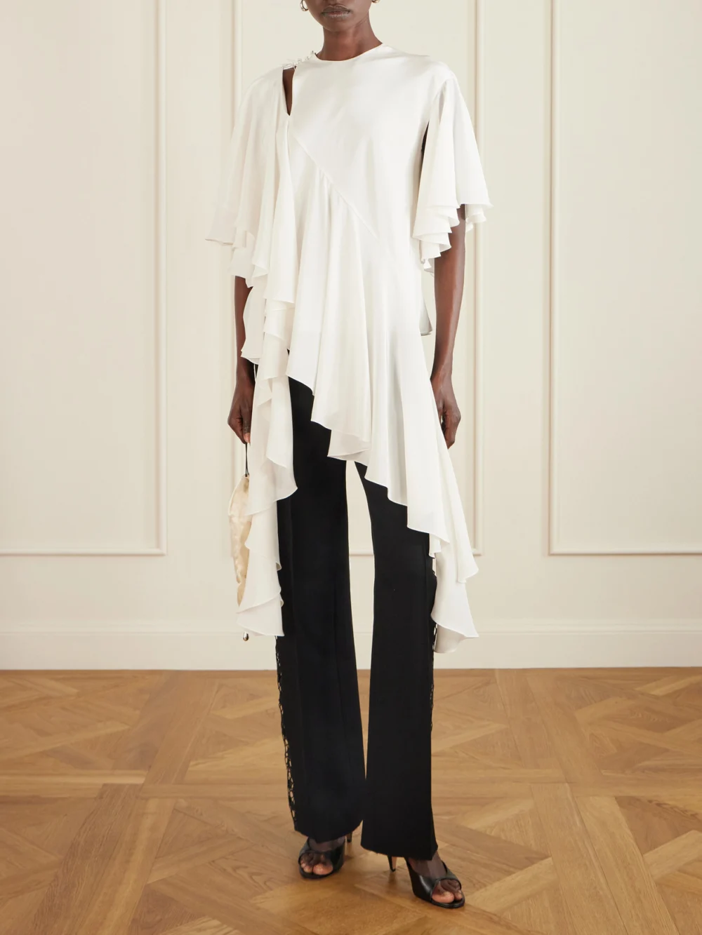 Sharon Wauchob Thea Asymmetric Ruffled Cutout Silk Top, worn by a model
