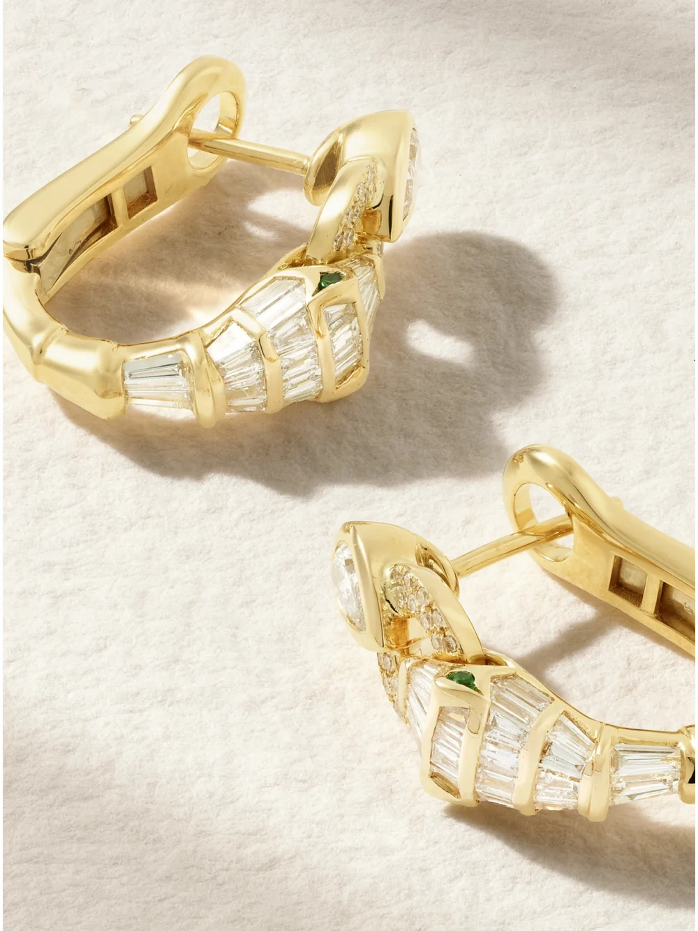 Close-up detail of the Shay Serpentine 18-karat Gold, Diamond and Garnet Earrings