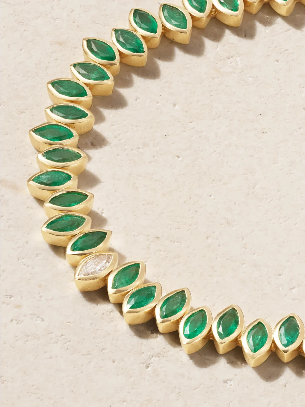 Close-up detail of the Shay Staggered 18-karat Gold, Emerald and Diamond Bracelet