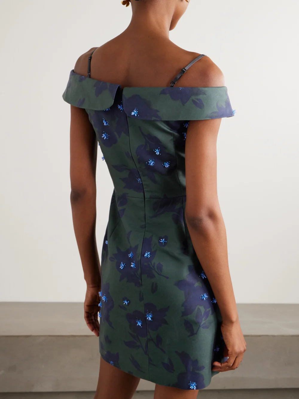 Back view of the Shushu/Tong Asymmetric Off-the-shoulder Embellished Floral-print Cotton Mini Dress