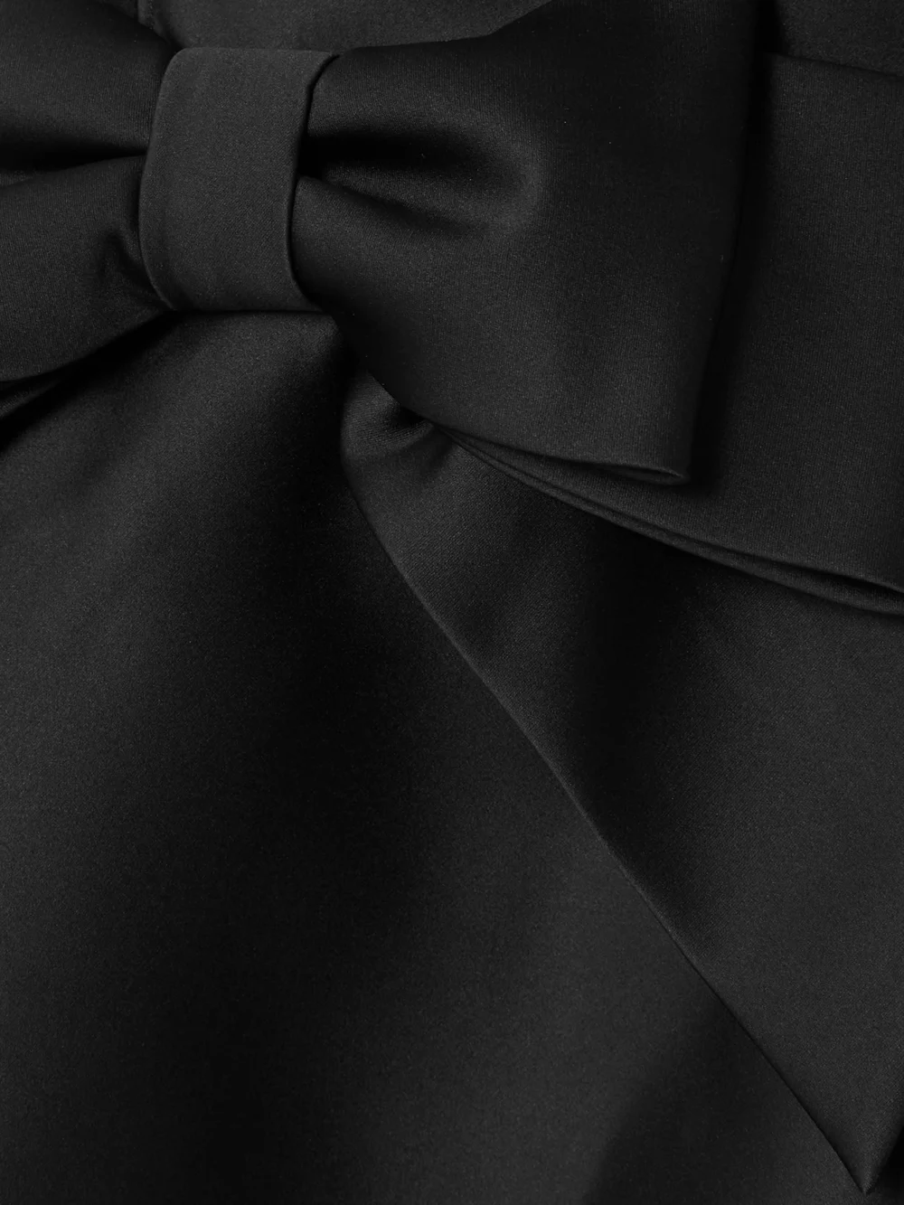 Close-up detail of the Shushu/Tong Bow-detailed Gathered Satin Mini Dress