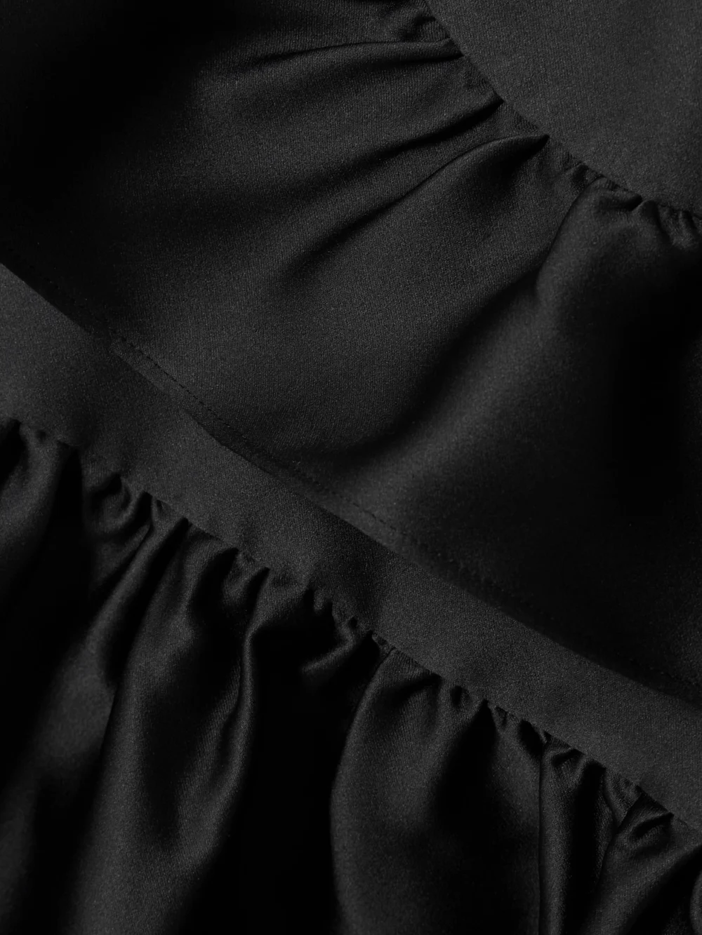 Close-up detail of the Shushu/Tong Bow-detailed Ruffled Mikado Mini Dress