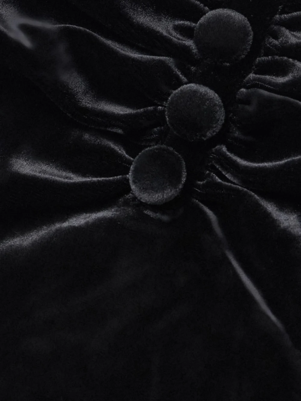Close-up detail of the Shushu/Tong Gathered Velvet Mini Dress
