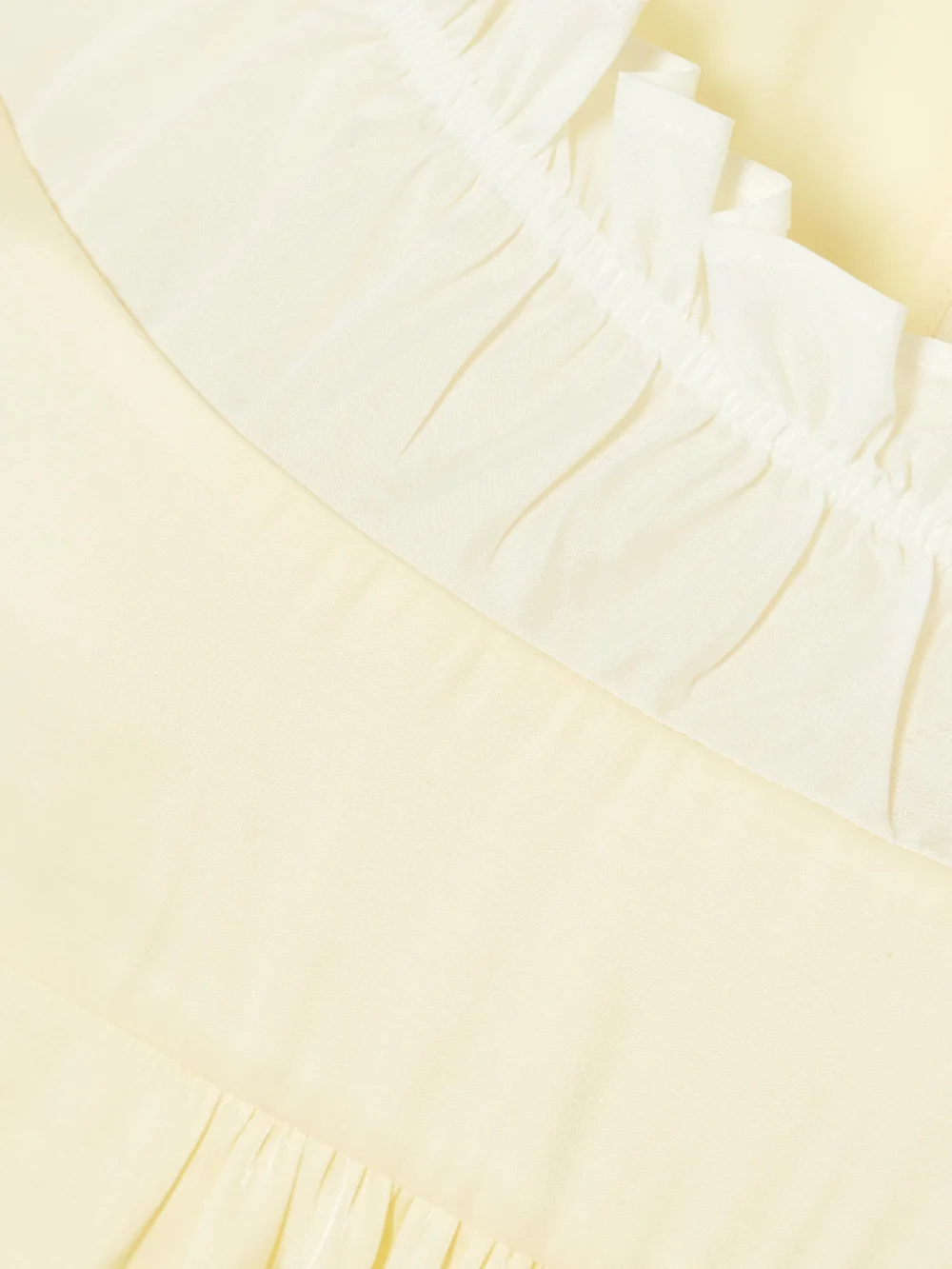 Close-up detail of the Shushu/Tong Ruffled Chiffon-trimmed Satin Mini Dress