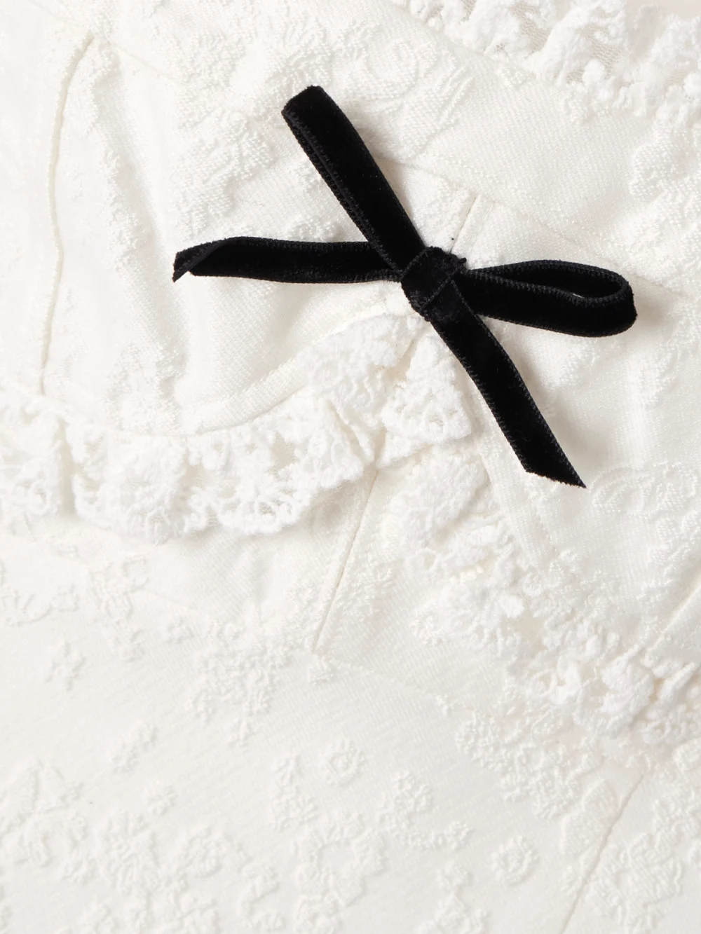 Close-up detail of the Shushu/Tong Velvet- and Lace-trimmed Brocade Gown