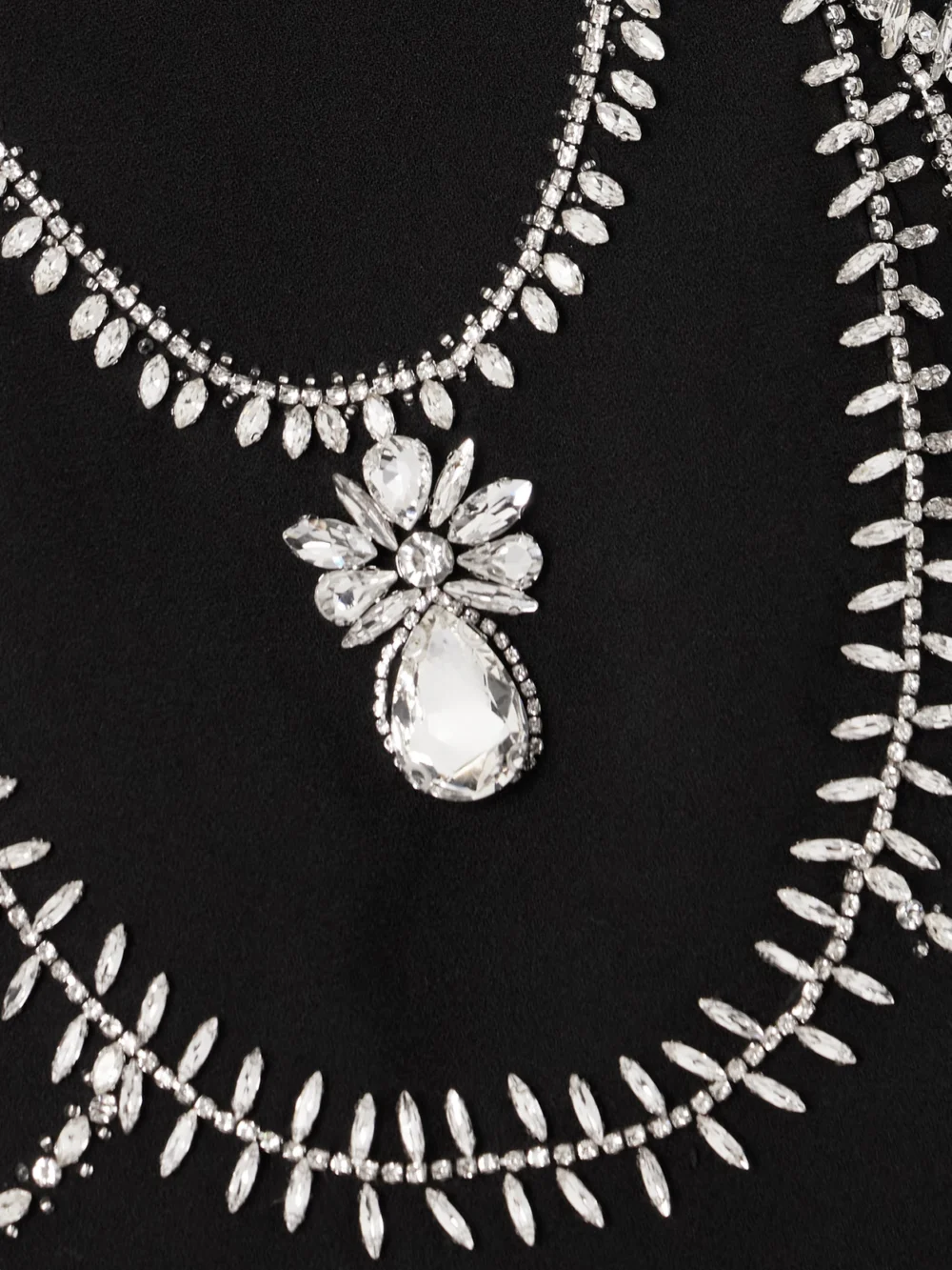 Close-up detail of the Simkhai Arta Strapless Crystal-embellished Cady Mini Dress