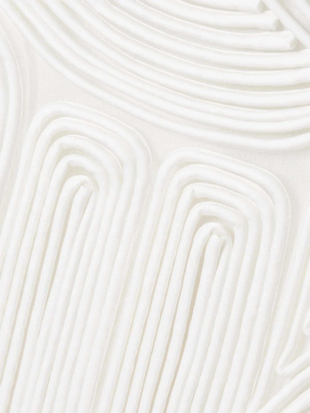Close-up detail of the Simkhai Darby Fringed Appliquéd Tulle Midi Dress