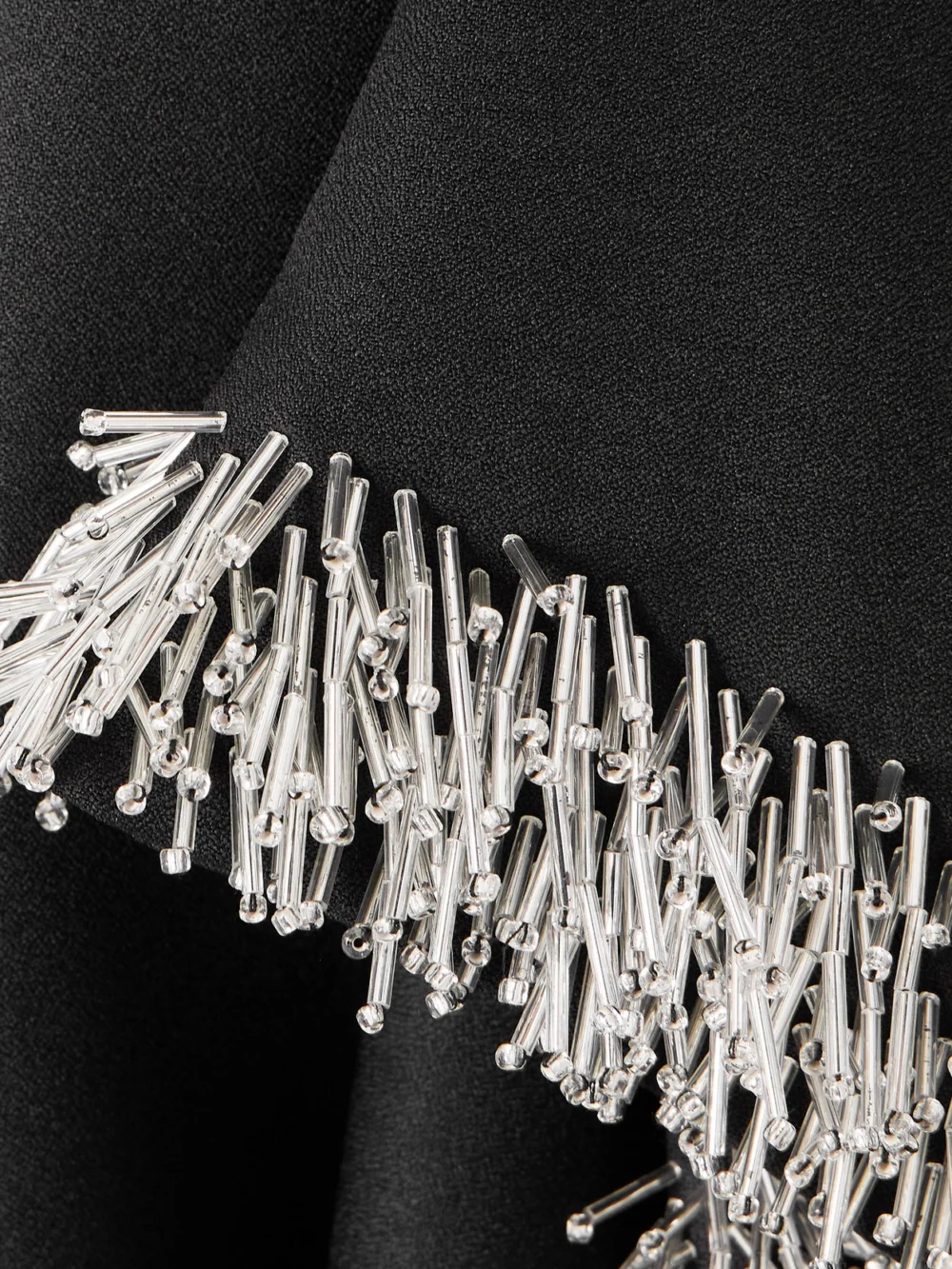 Close-up detail of the Simkhai Darcy Embellished Crepe Mini Dress
