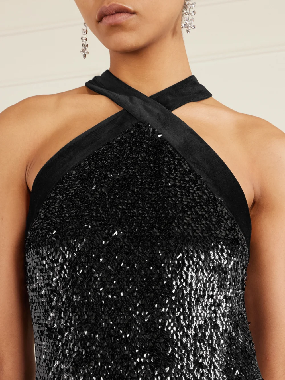 Close-up detail of the Simkhai Isla Velvet-trimmed Sequined Jersey Halterneck Mini Dress