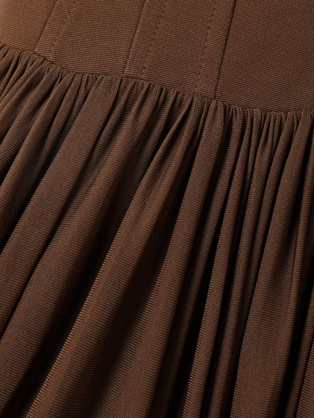 Close-up detail of the Simkhai Jamie Jersey Midi Dress