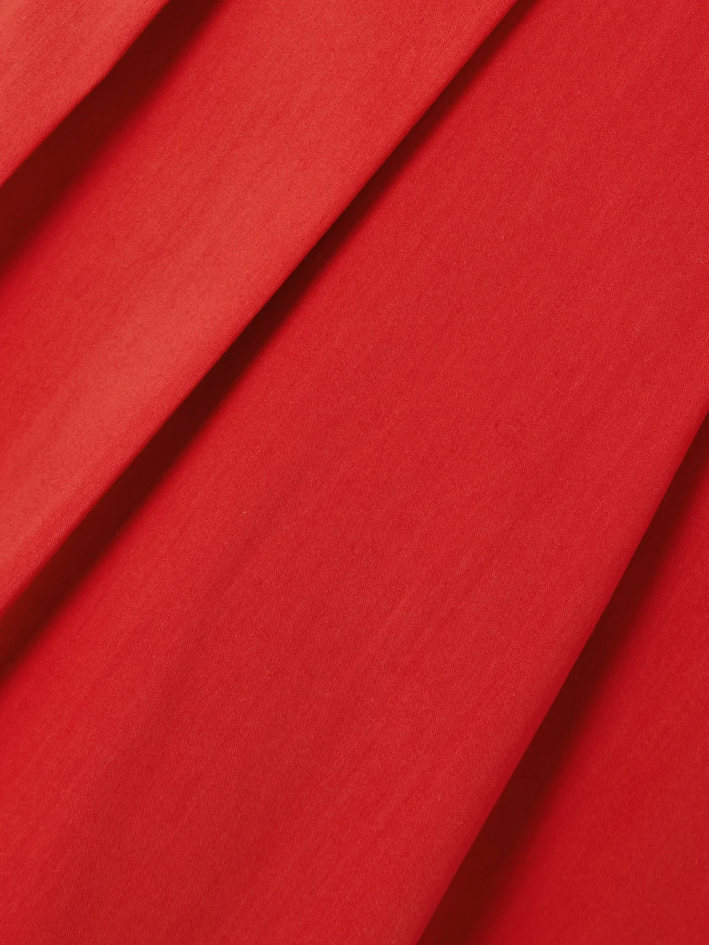 Close-up detail of the Simkhai Jazz Pleated Cotton-blend Poplin Midi Shirt Dress