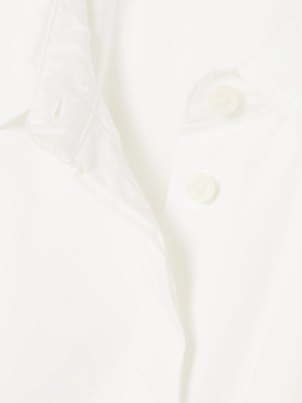 Close-up detail of the Simkhai Jazz Pleated Cotton-blend Poplin Midi Shirt Dress