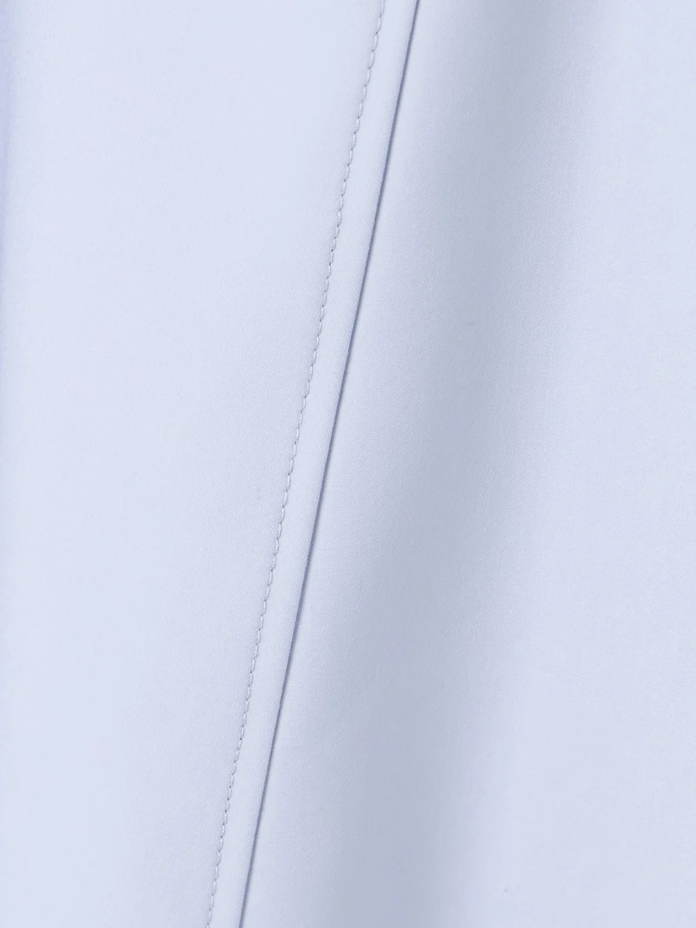 Close-up detail of the Simkhai Marisol Paneled Cotton-blend Maxi Dress