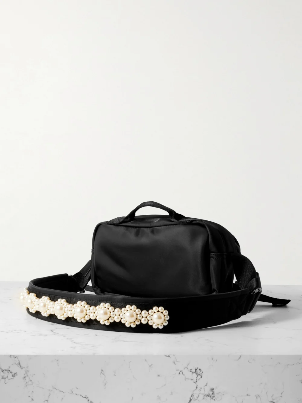 Back view of the Simone Rocha Bow and Pearl-like Embellished Shell Belt Bag