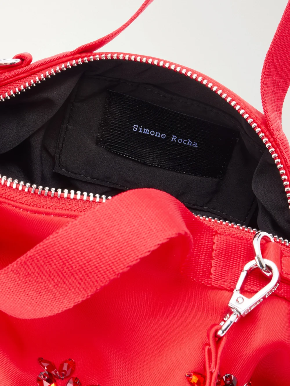 Close-up detail of the Simone Rocha Double Ribbon Rosette Crystal-embellished Satin Shoulder Bag