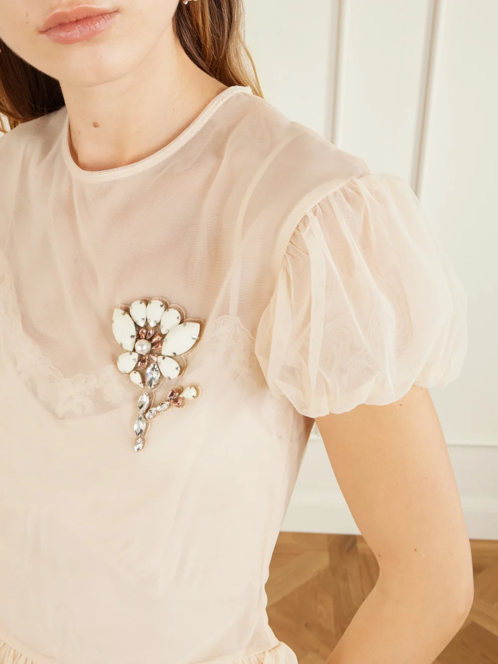 Close-up detail of the Simone Rocha Embellished Organza Peplum Blouse