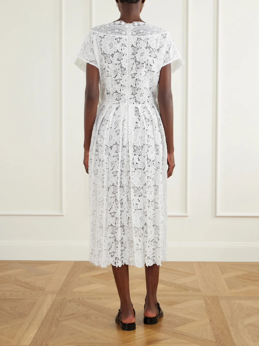 Back view of the Simone Rocha Embellished Pleated Lace Midi Dress