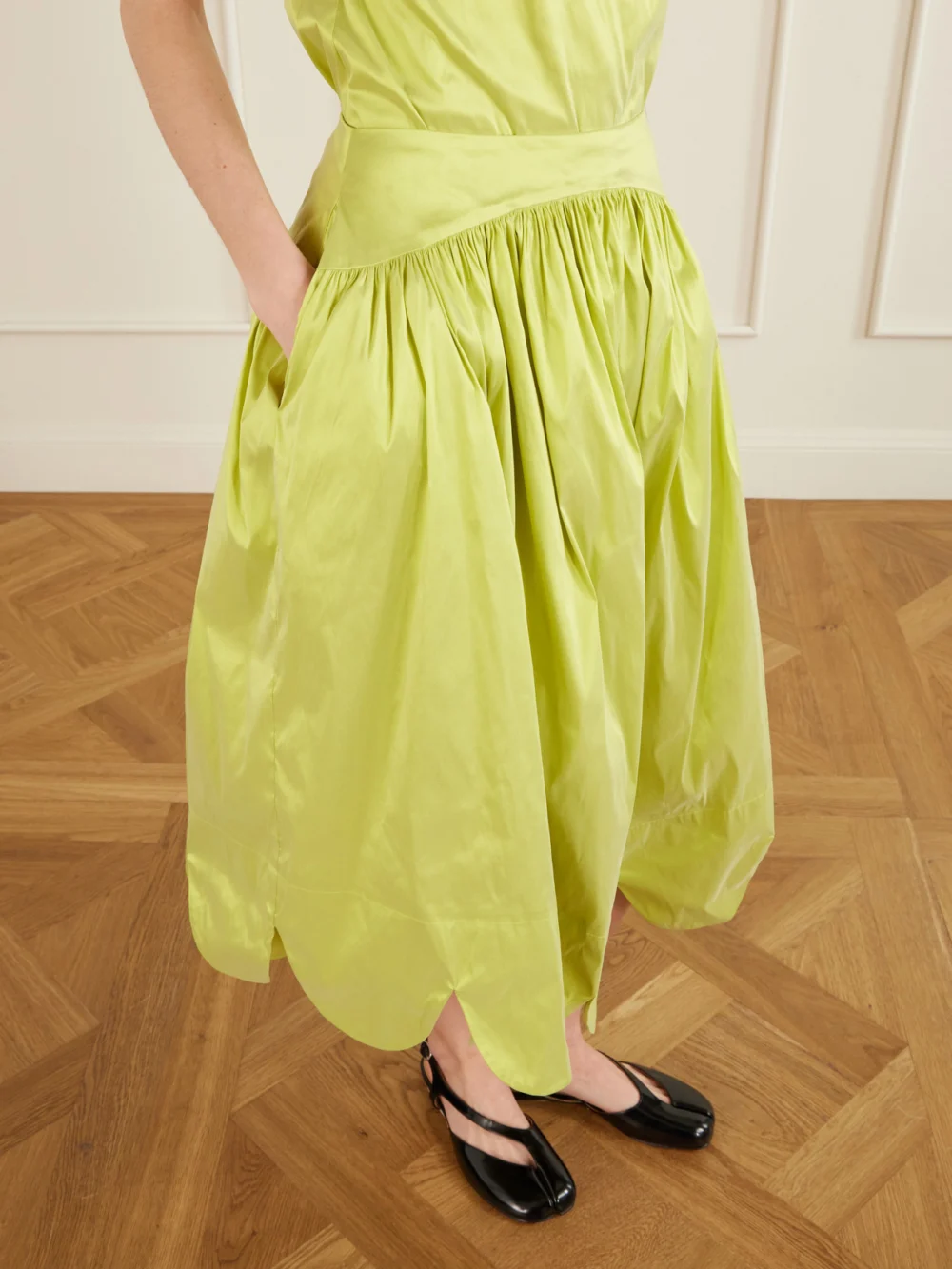 Close-up detail of the Simone Rocha Petal Hem Basque Midi Skirt