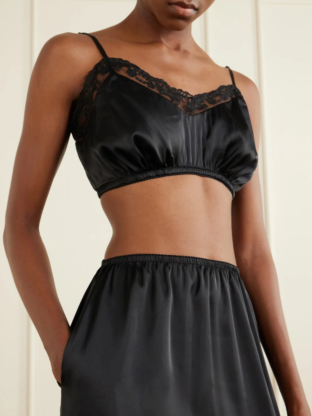 Close-up detail of the Simone Rocha Ruffled Satin Midi Skirt