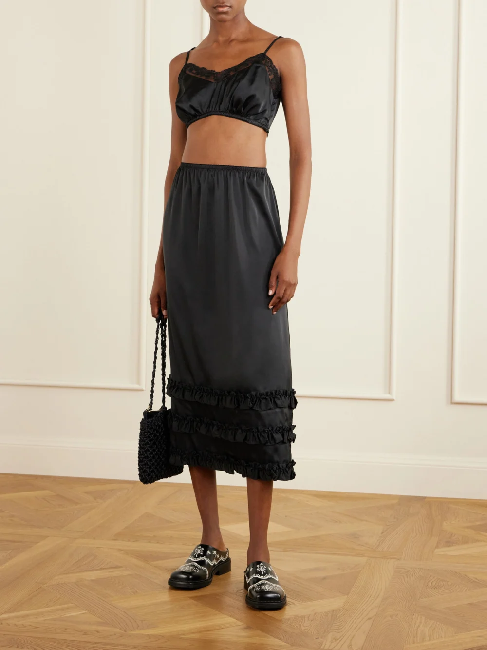 Simone Rocha Ruffled Satin Midi Skirt, worn by a model