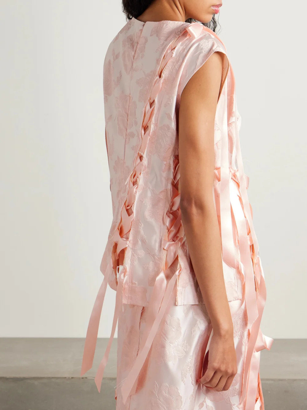 Back view of the Simone Rocha Unraveling Ribbon Lace-up Frayed Brocade Top