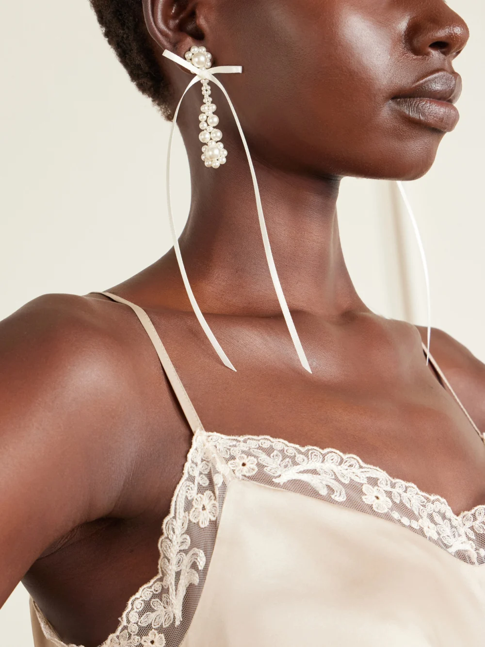 Simone Rocha Victorian Bow-detailed Pearl-like Earrings, styled view