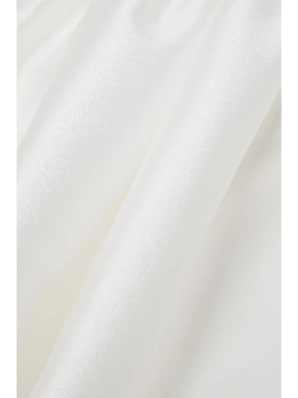 Close-up detail of the Solace London Alda Satin-twill and Crepe Peplum Gown